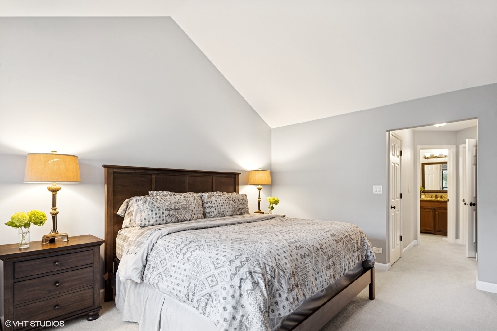 199 Springdale Lane Bloomingdale, IL 60108 - Photo 28 of 70 a bedroom with a bed and lamps