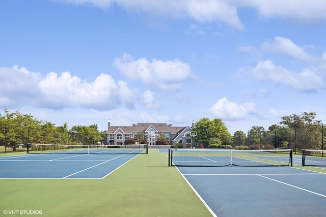 199 Springdale Lane Bloomingdale, IL 60108 - Photo 57 of 70 a view of an outdoor space and tennis court