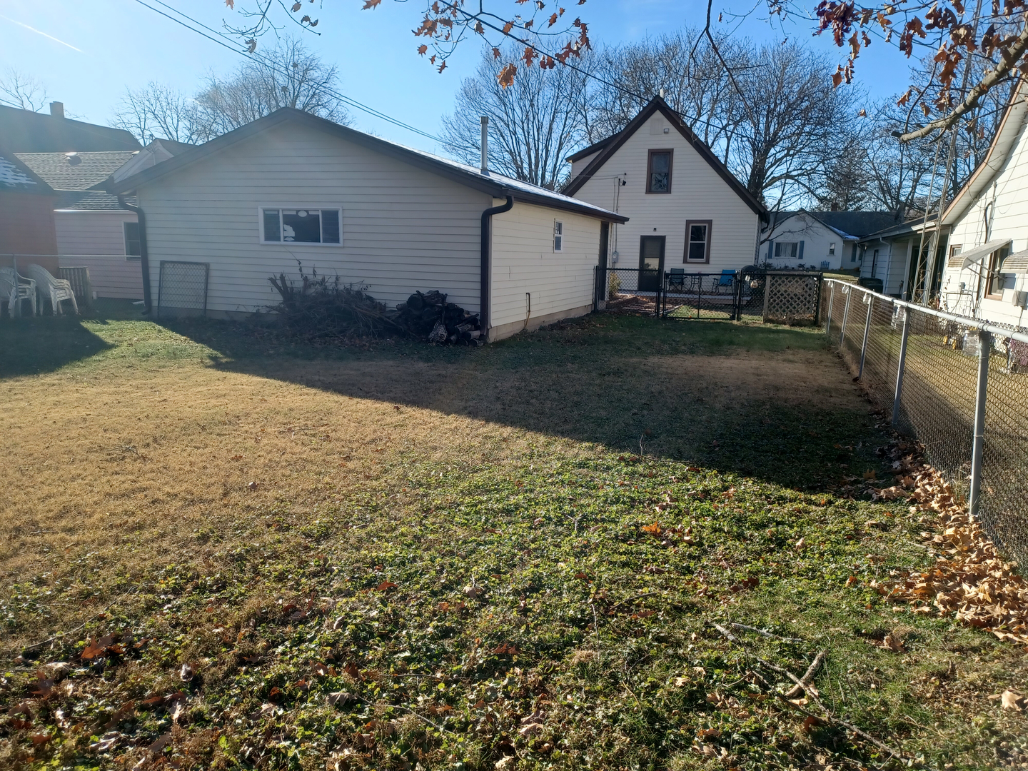 206 South Stott Street Genoa, IL 60135 - Photo 18 of 18 a house view with a backyard space