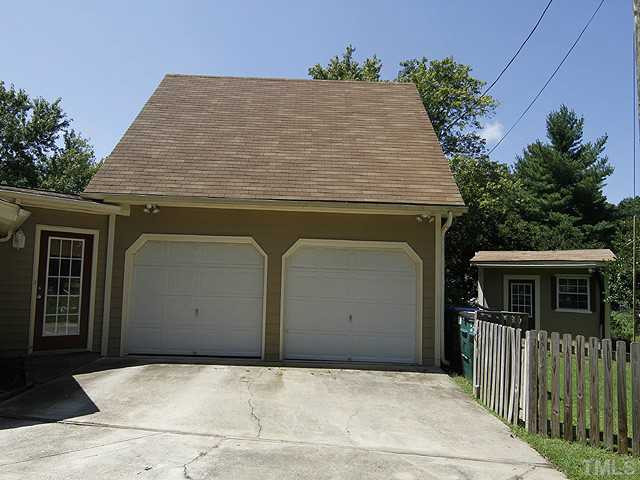 1812 Euclid Road Durham, NC 27713 - Photo 11 of 13 a house with trees in front of it