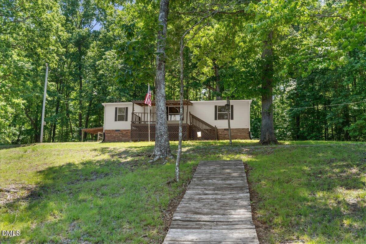 1111 Stoney Mountain Road Rougemont, NC 27572 - Photo 3 of 30 a view of a back yard