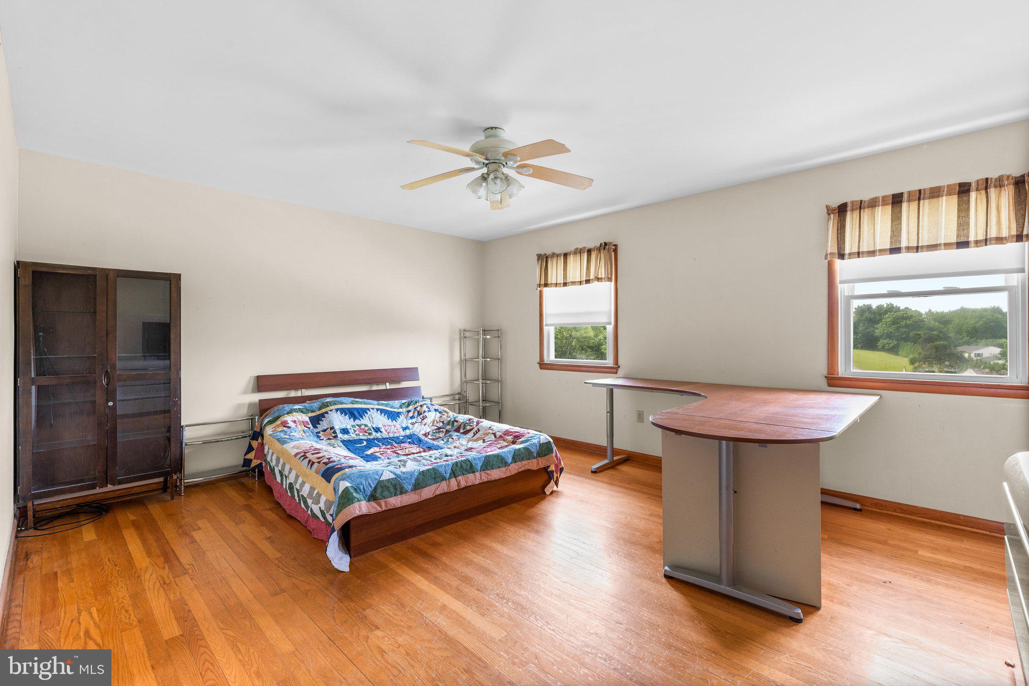 10110 Old Liberty Road Frederick, MD 21701 - Photo 16 of 65 a living room with furniture and a window