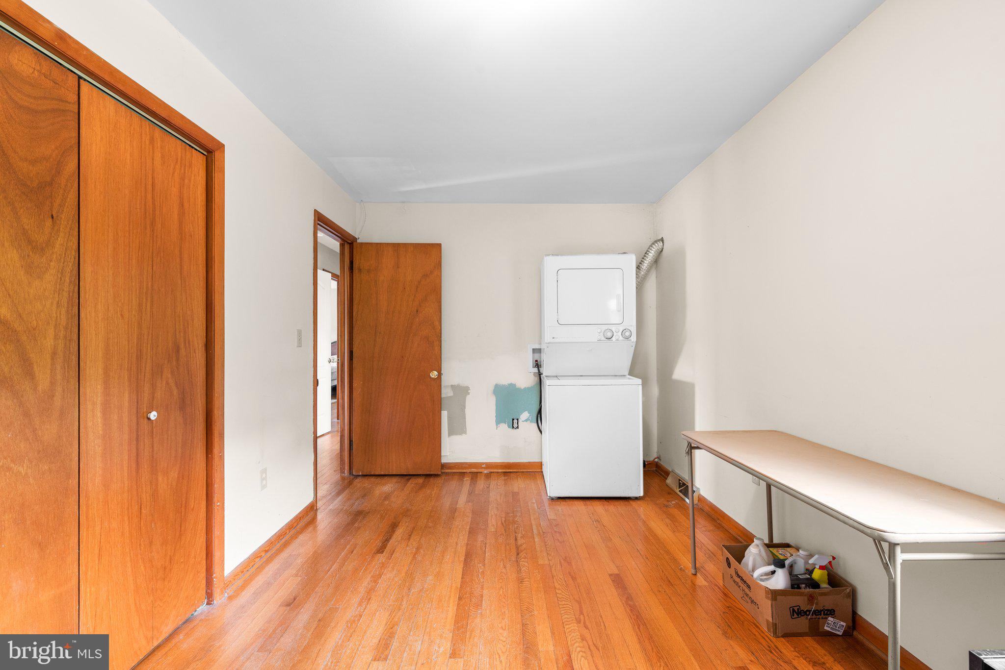 10110 Old Liberty Road Frederick, MD 21701 - Photo 19 of 65 a view of empty room with wooden floor and fan