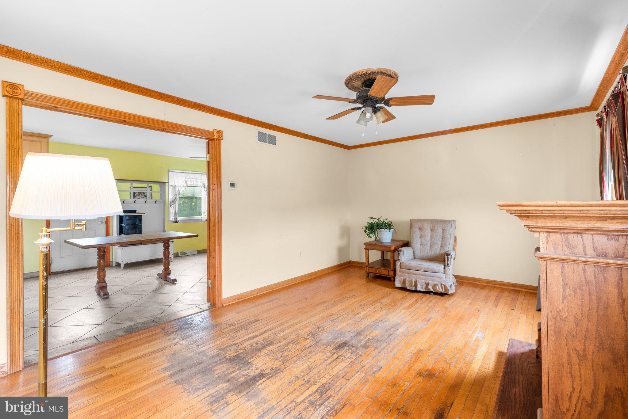 10110 Old Liberty Road Frederick, MD 21701 - Photo 21 of 65 a living room with furniture and a table