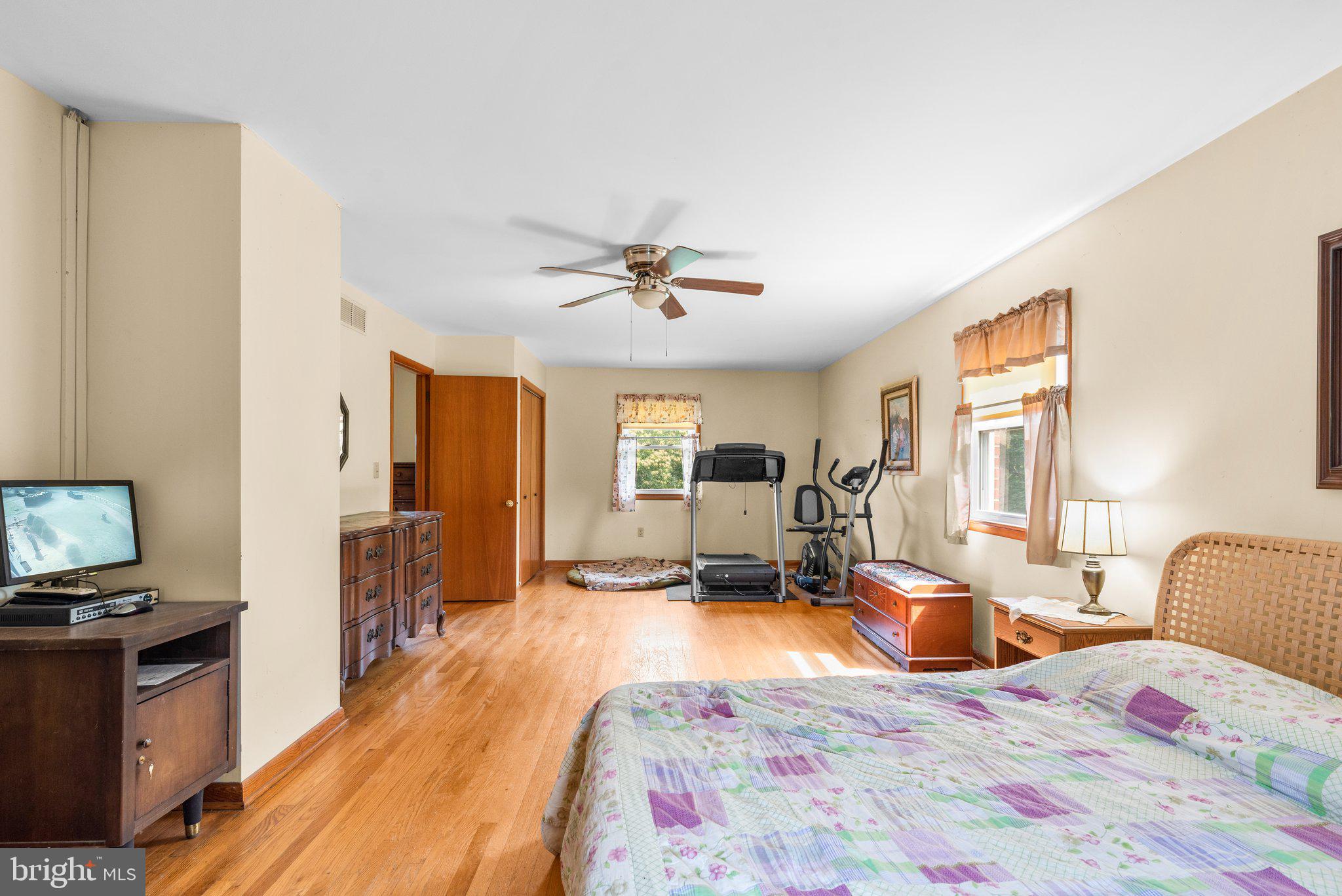 10110 Old Liberty Road Frederick, MD 21701 - Photo 23 of 65 a bed room with a bed window and a television