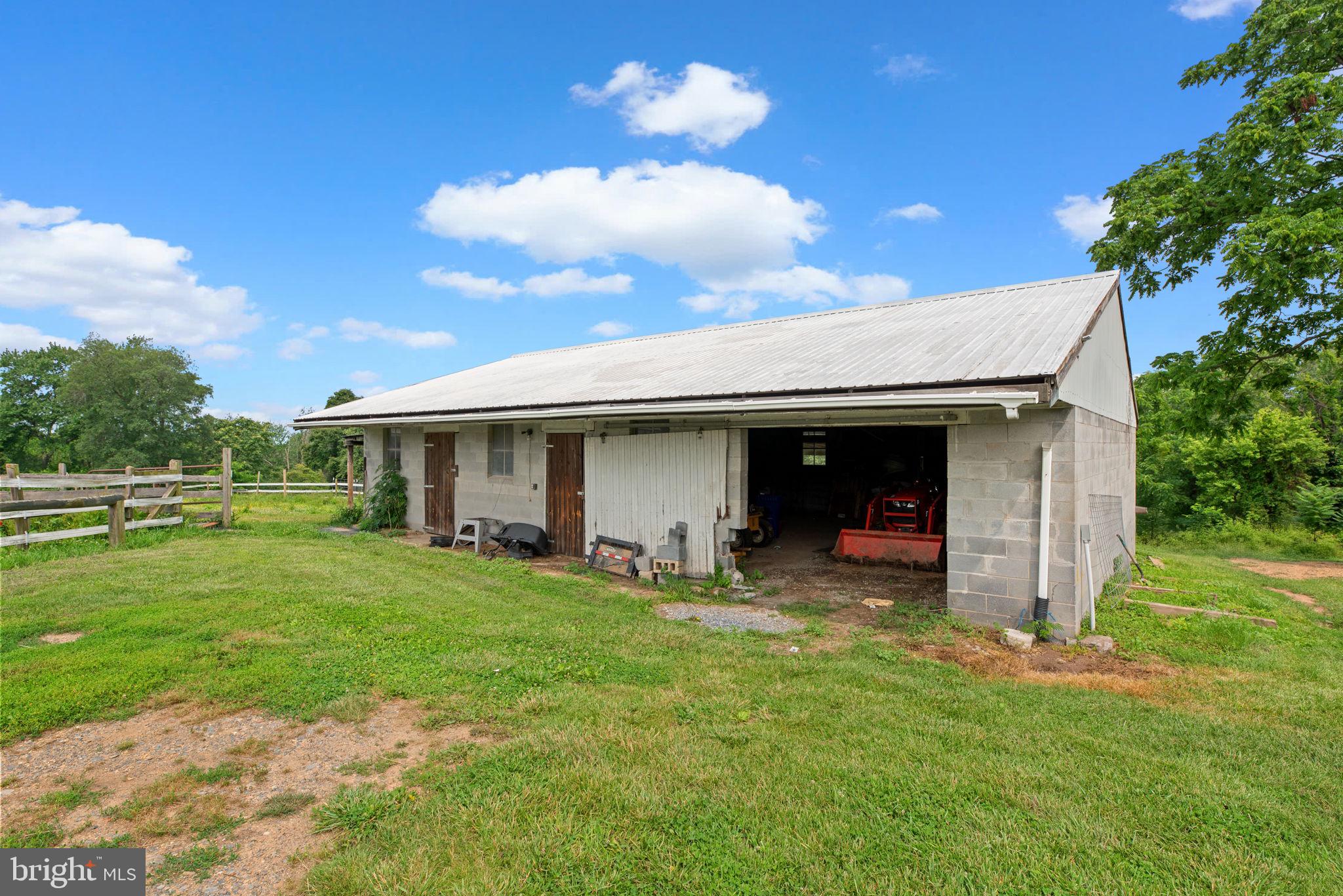 10110 Old Liberty Road Frederick, MD 21701 - Photo 26 of 65 a view of a backyard with a garden and entertaining space