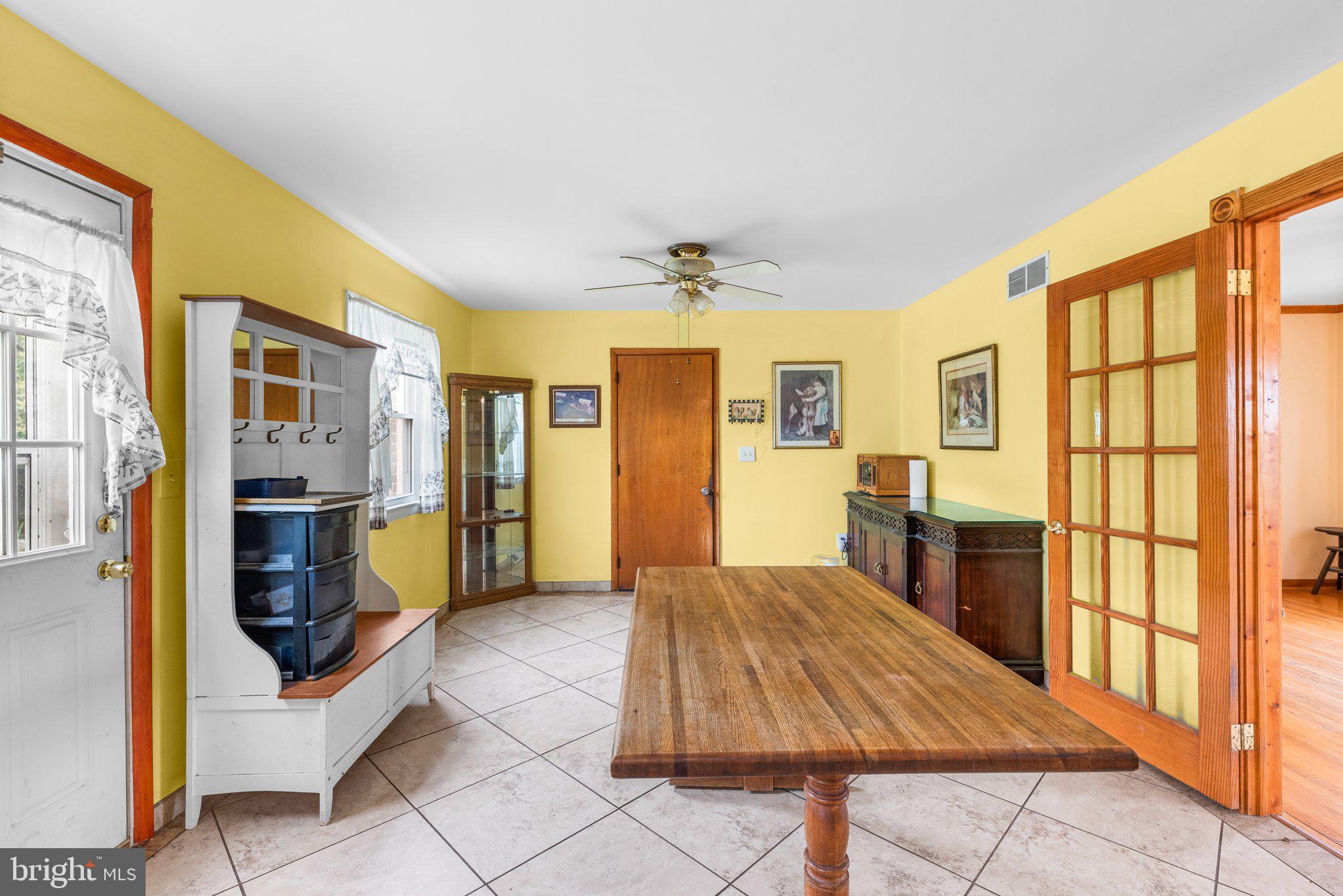 10110 Old Liberty Road Frederick, MD 21701 - Photo 5 of 65 a spacious bedroom with a bed and a dresser