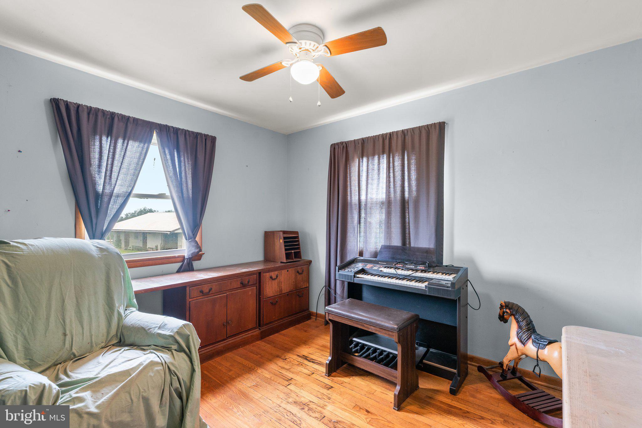 10110 Old Liberty Road Frederick, MD 21701 - Photo 9 of 65 a living room with furniture and a window