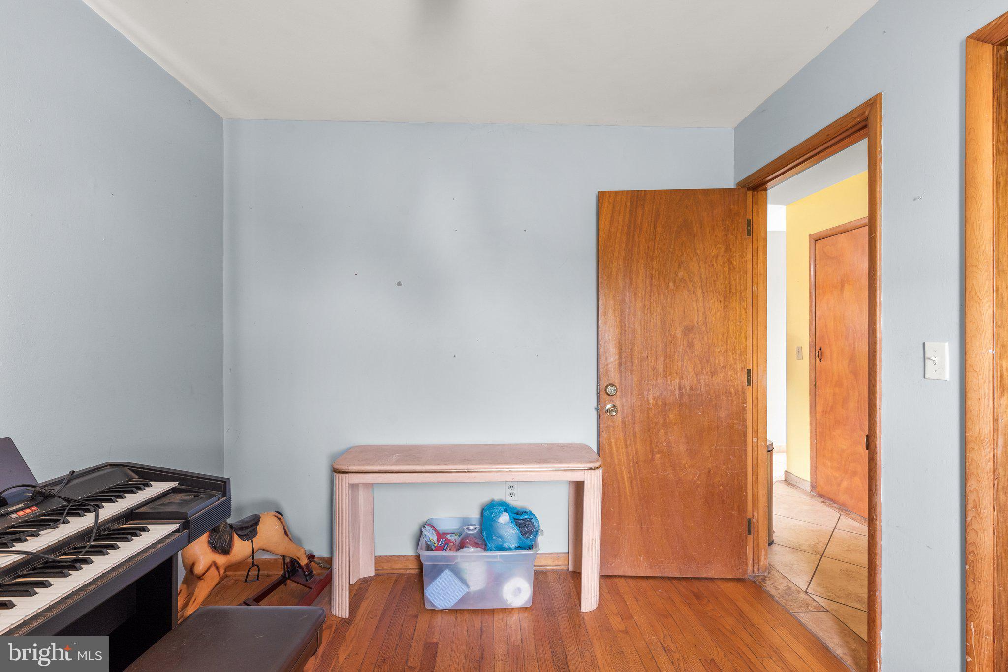 10110 Old Liberty Road Frederick, MD 21701 - Photo 10 of 65 a view of a livingroom with furniture and wooden floor