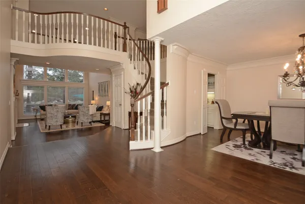 a view of a livingroom with furniture and a dinning table