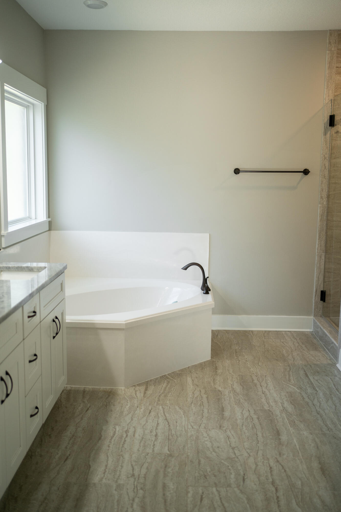 6157 Buckward Road Baker, FL 32531 - Photo 34 of 61 a bathroom with a bathtub and a sink