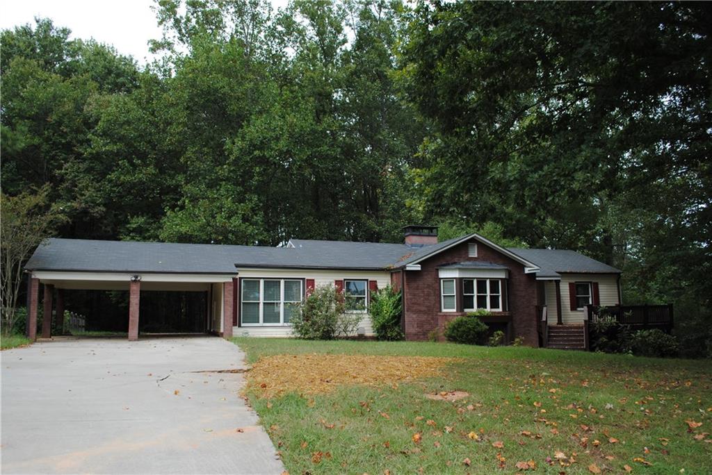 4905 Howard Road Cumming, GA 30040 - Photo 1 of 1 Charming Vinyl and Brick Ranch on 1.14 Acre Lot