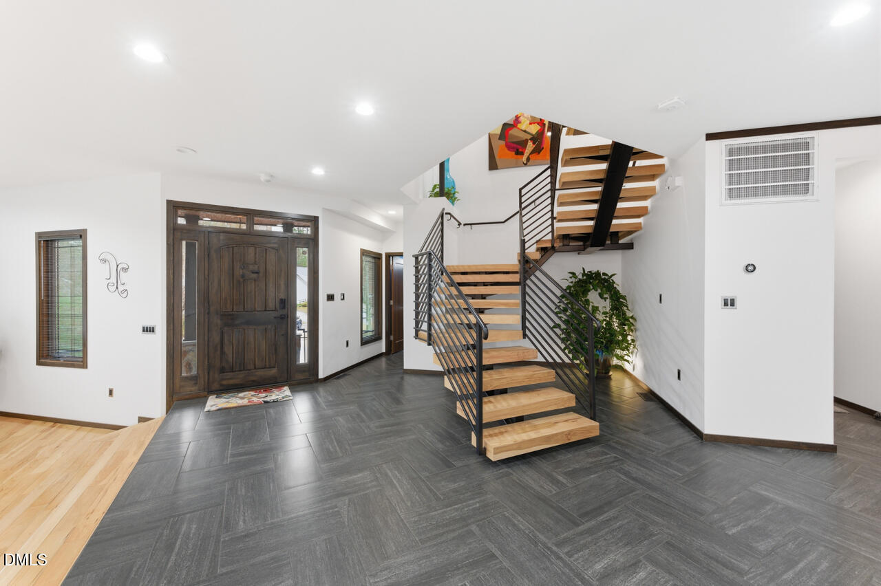 3315 Denada Path Durham, NC 27707 - Photo 4 of 74 a view of an entryway with wooden floor