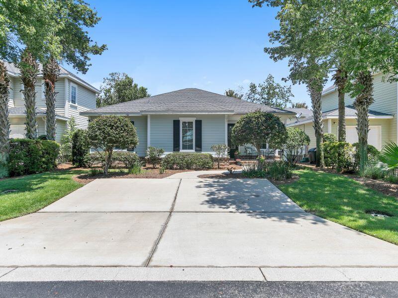 232 South Zander Way Santa Rosa Beach, FL 32459 - Photo 1 of 26 a front view of a house with yard