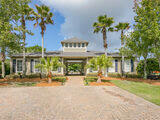 232 South Zander Way Santa Rosa Beach, FL 32459 - Photo 21 of 26 a view of a building with a garden