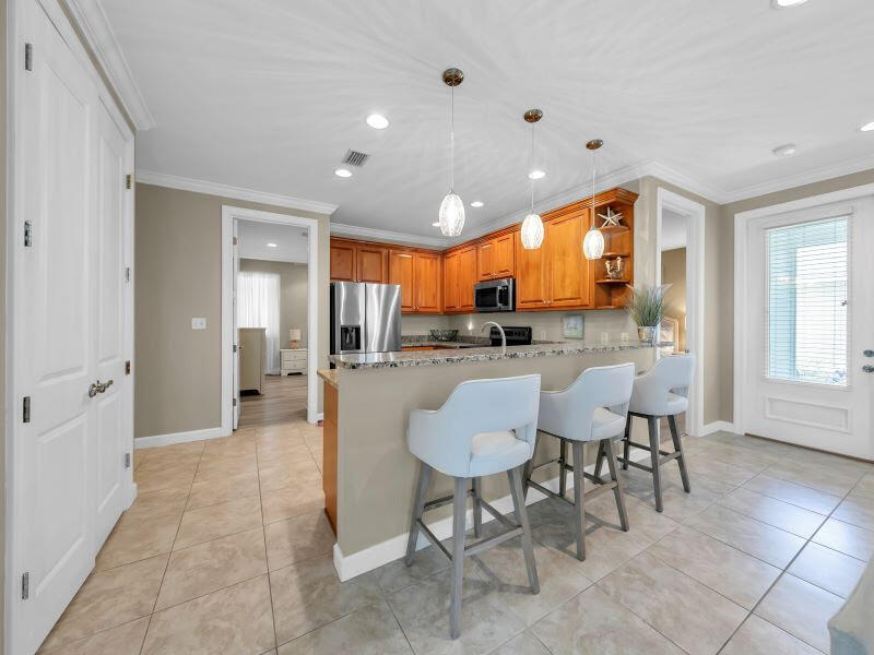 232 South Zander Way Santa Rosa Beach, FL 32459 - Photo 7 of 26 a view of a dining room with furniture