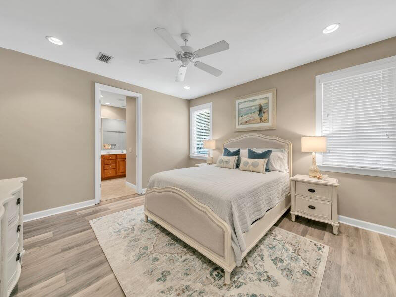 232 South Zander Way Santa Rosa Beach, FL 32459 - Photo 9 of 26 a bedroom with a bed and a window