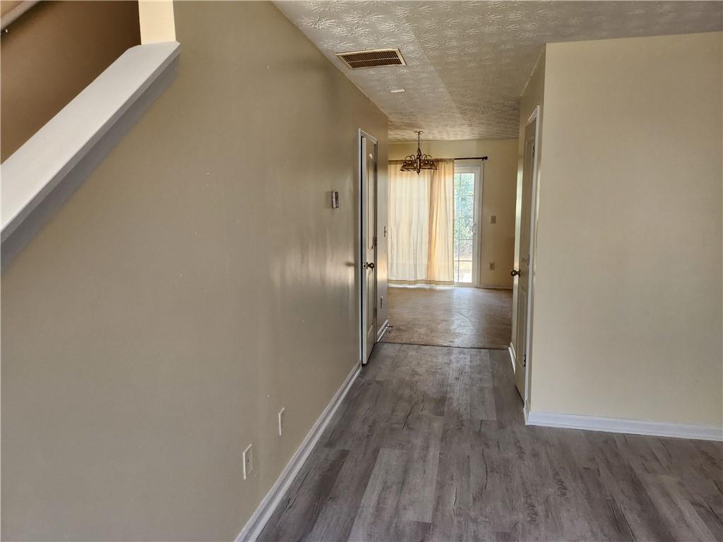 2935 Fields Drive Lithonia, GA 30038 - Photo 3 of 13 a view of gallery with wooden floor