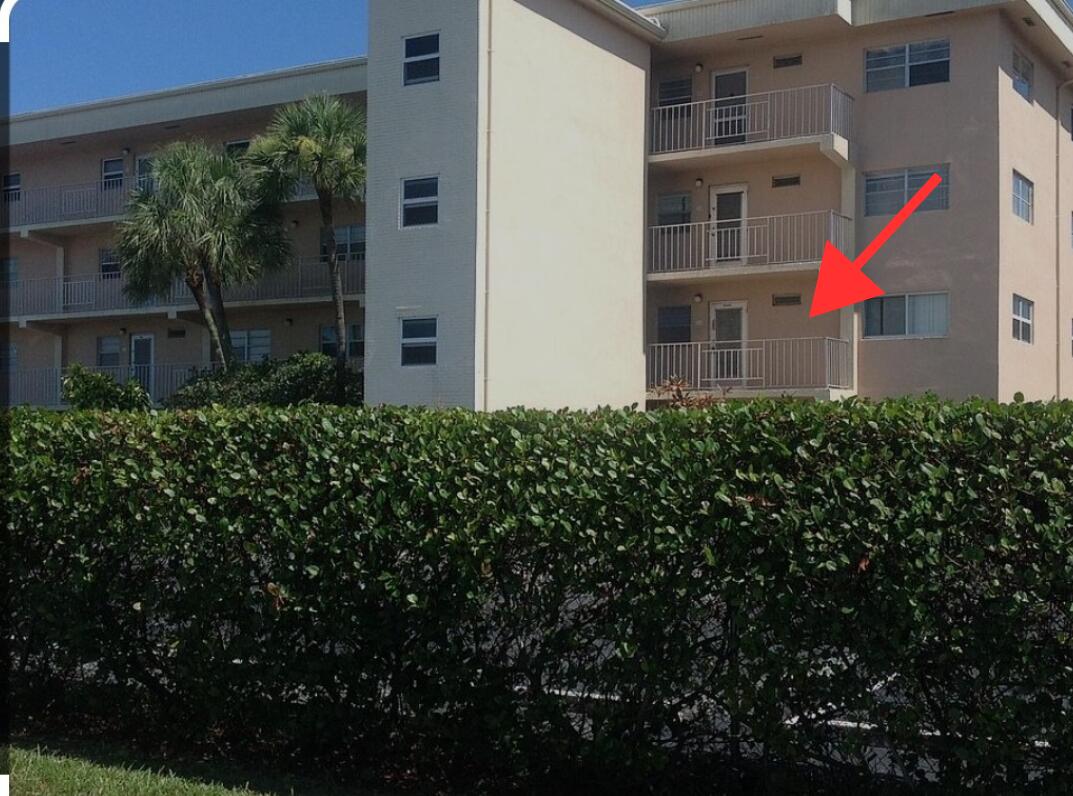 230 Northeast 26th Avenue, Unit 2140 Boynton Beach, FL 33435 - Photo 1 of 9 an aerial view of a house