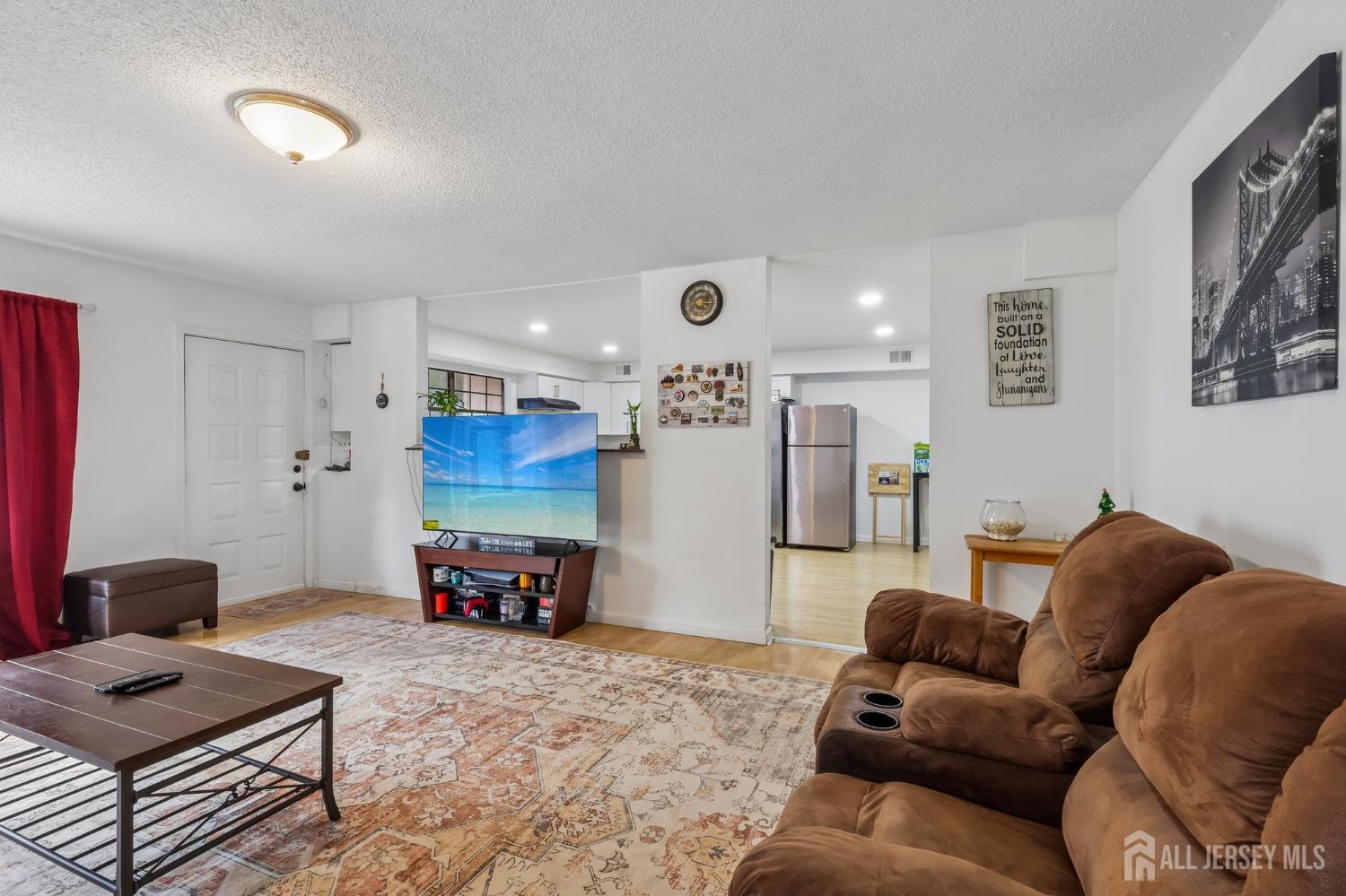 36 Henry Street Edison, NJ 08820 - Photo 6 of 42 a living room with furniture and a couch