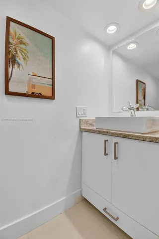 a outdoor living space with patio furniture and a potted plant