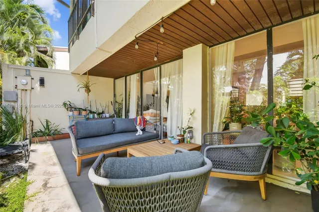 a bedroom with a workspace