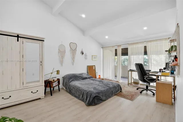 a bathroom with a double vanity sink a toilet and a mirror