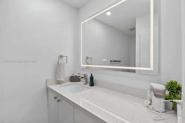 a bathroom with a toilet and a bathtub