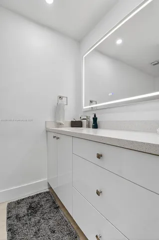 a bedroom with a workspace