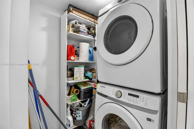 an aerial view of residential houses with city view