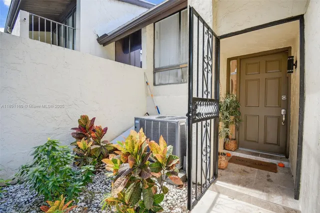 a view of a garden with a fountain