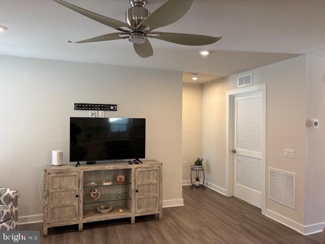 17 Senators Way Berlin, NJ 08009 - Photo 12 of 37 a living room with furniture and flat screen tv
