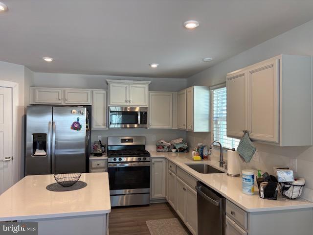 17 Senators Way Berlin, NJ 08009 - Photo 17 of 37 a kitchen with granite countertop a refrigerator stove top oven and sink