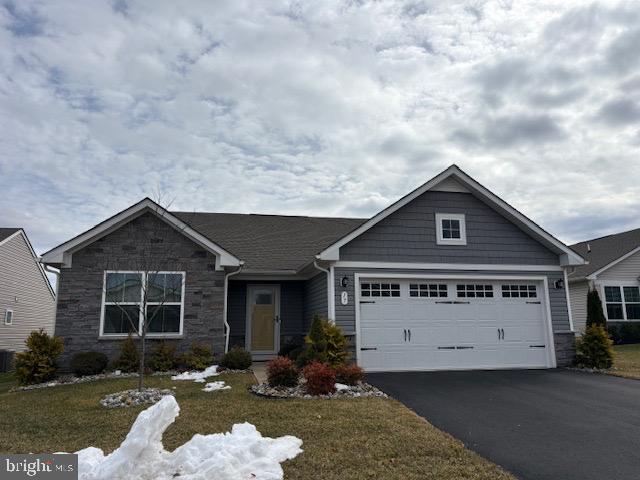 17 Senators Way Berlin, NJ 08009 - Photo 2 of 37 a front view of a house with a yard