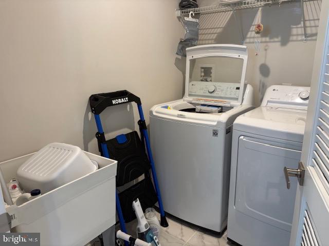 17 Senators Way Berlin, NJ 08009 - Photo 26 of 37 a utility room with dryer and washer