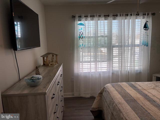 17 Senators Way Berlin, NJ 08009 - Photo 28 of 37 a bedroom with a bed and a flat tv screen on the dresser