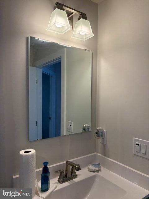 17 Senators Way Berlin, NJ 08009 - Photo 36 of 37 a bathroom with a sink and a mirror