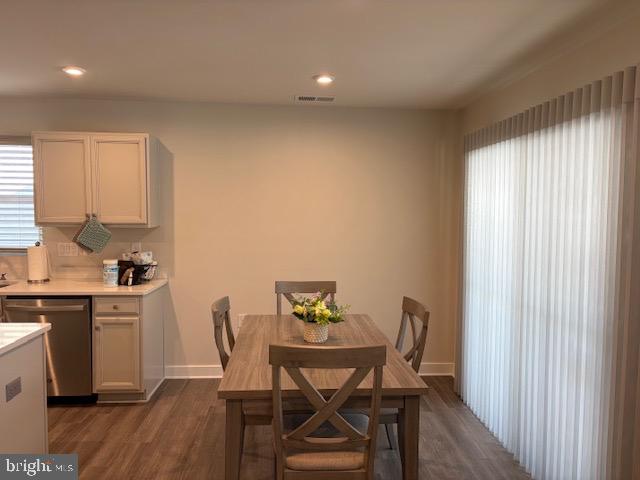 17 Senators Way Berlin, NJ 08009 - Photo 10 of 37 a view of a dining room with furniture and wooden floor
