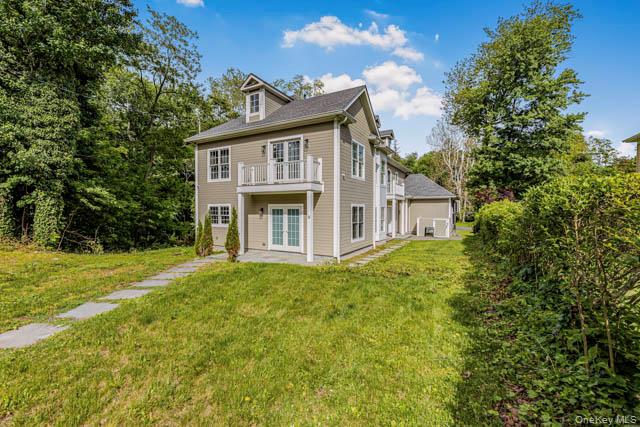 1 Kewanee Road New Rochelle, NY 10804 - Photo 28 of 36 a view of a big house with a big yard and large trees