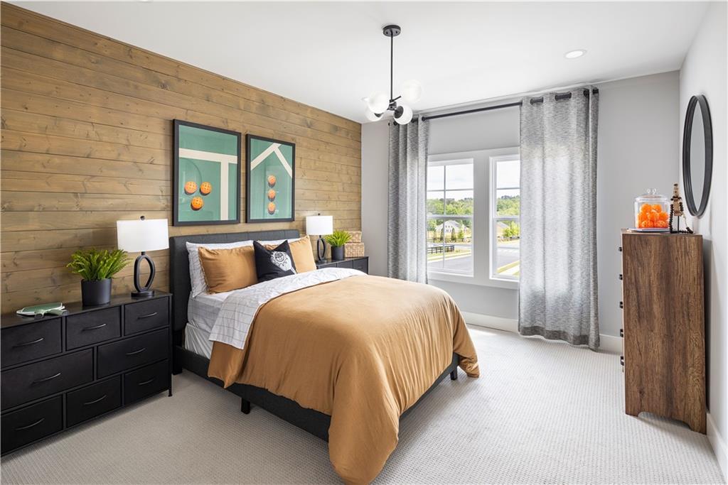 760 Keystone Drive Woodstock, GA 30188 - Photo 14 of 26 a spacious bedroom with a bed dresser and a window