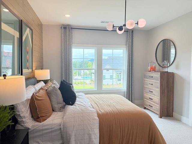 760 Keystone Drive Woodstock, GA 30188 - Photo 15 of 26 a bedroom with bed a chandelier and a window