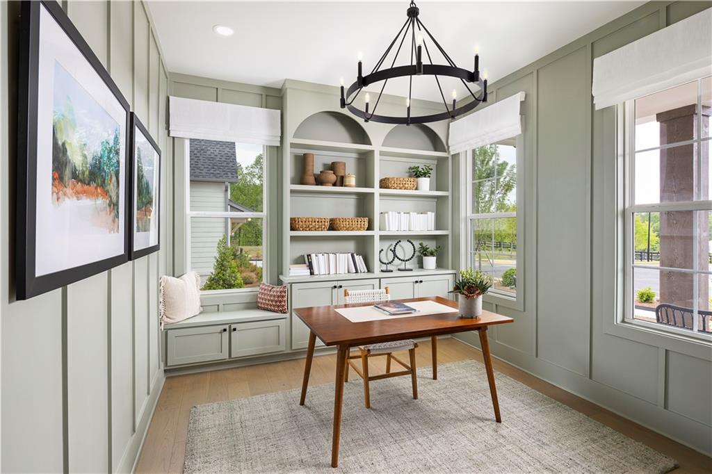 760 Keystone Drive Woodstock, GA 30188 - Photo 2 of 26 a view of a livingroom with furniture window and a wooden door