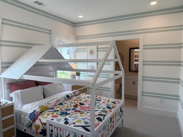 760 Keystone Drive Woodstock, GA 30188 - Photo 21 of 26 a bed sitting in a bedroom next to a window