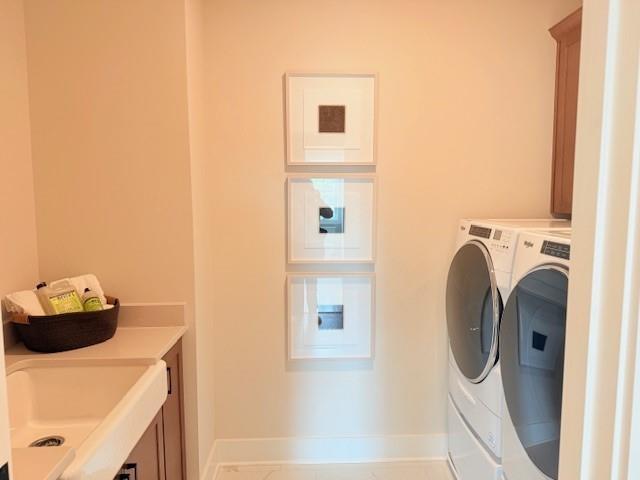 760 Keystone Drive Woodstock, GA 30188 - Photo 23 of 26 a utility room with dryer and washer