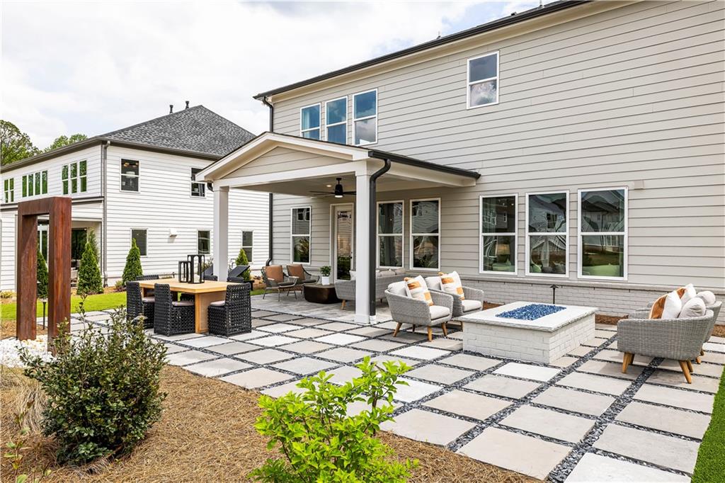 760 Keystone Drive Woodstock, GA 30188 - Photo 25 of 26 a view of a house with sitting area
