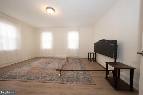 a view of a room with wooden walls