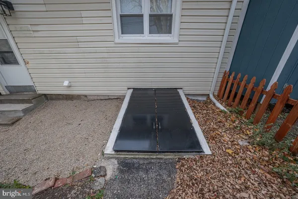a bathroom with a sink and a window