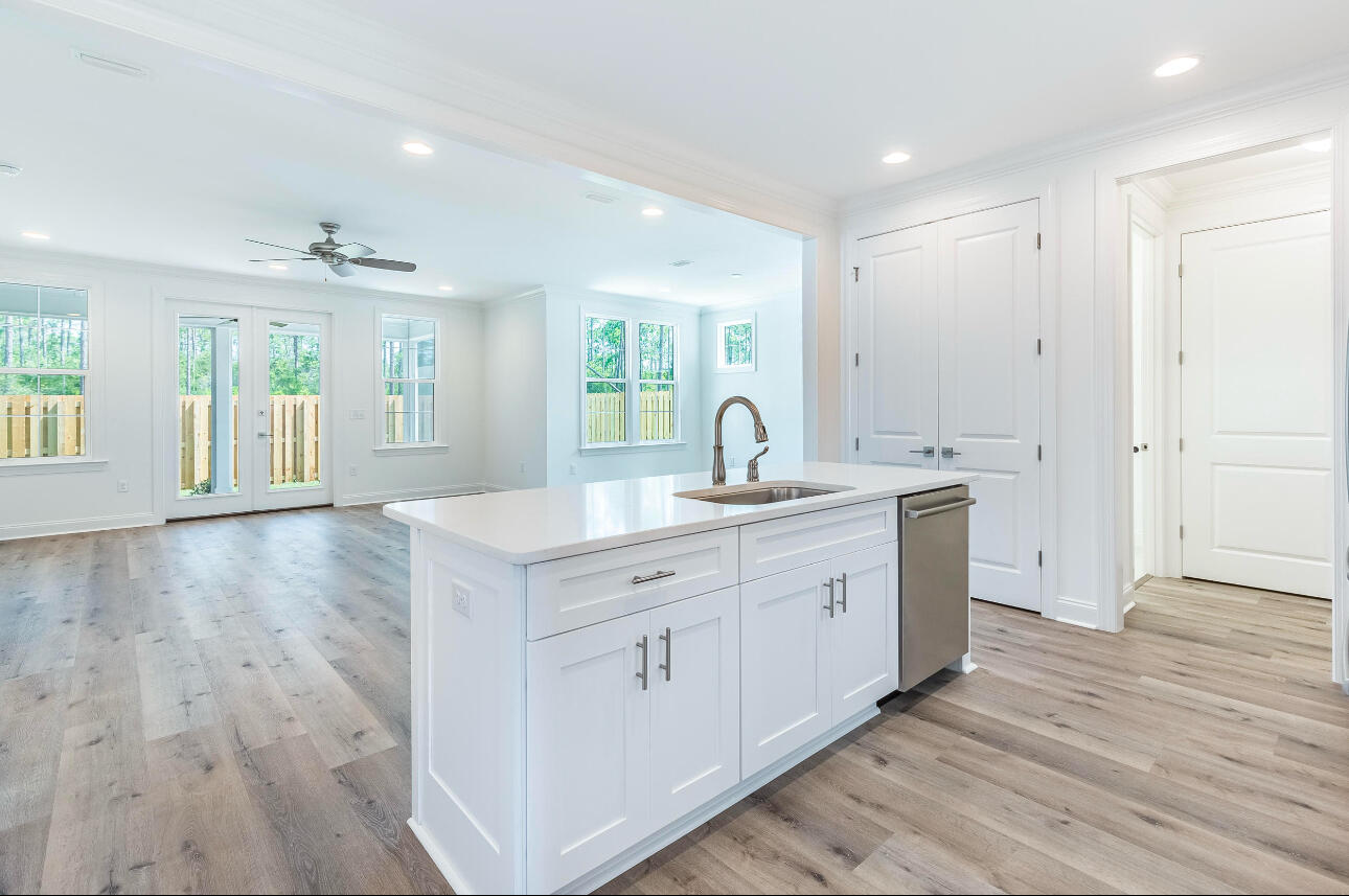 19 Conifer Ct Inlet Beach Inlet Beach, FL 32461 - Photo 2 of 5 a spacious bathroom with a double vanity sink a large mirror and shower