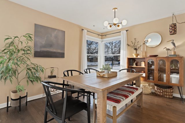 435 Sumac Road Highland Park, IL 60035 - Photo 7 of 30 a view of a dining room with furniture and wooden floor