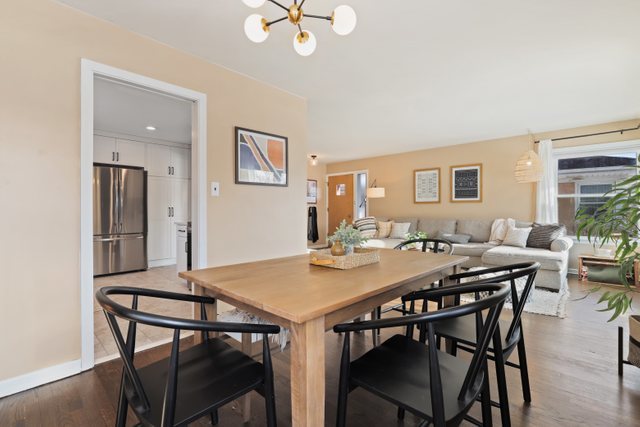 435 Sumac Road Highland Park, IL 60035 - Photo 8 of 30 a view of a dining room with furniture and a chandelier